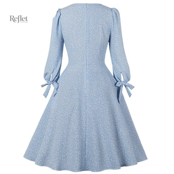 Robe colorée années 70 avec motifs floraux élégants