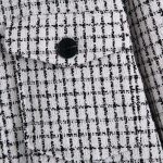 Chemise noire à carreaux pour un style rétro