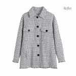 Vêtement femme en carreaux noirs au look vintage