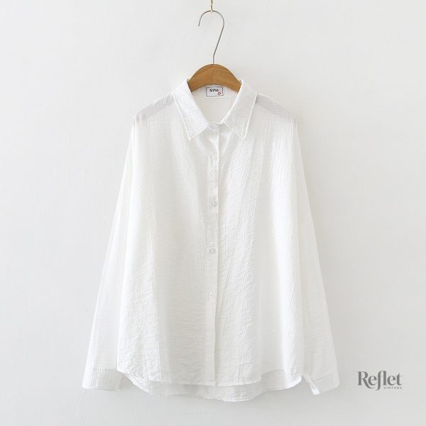 Chemise à manches longues au design classique