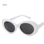 Grosses lunettes de soleil vintage à contour blanc