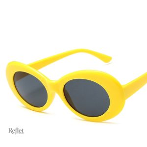 Lunettes de soleil femme style vintage avec contour blanc