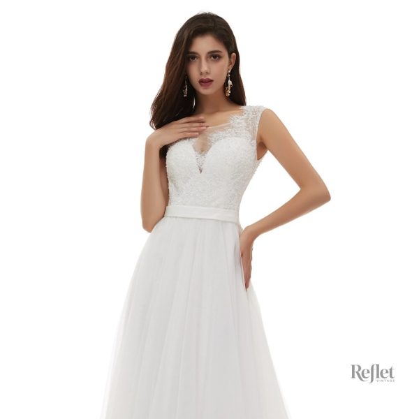 Robe de mariée blanche, look féerique et moderne