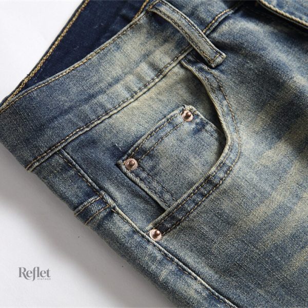 Jean homme style délavé avec finitions uniques