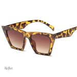 Lunettes de soleil blanches au look rétro chic
