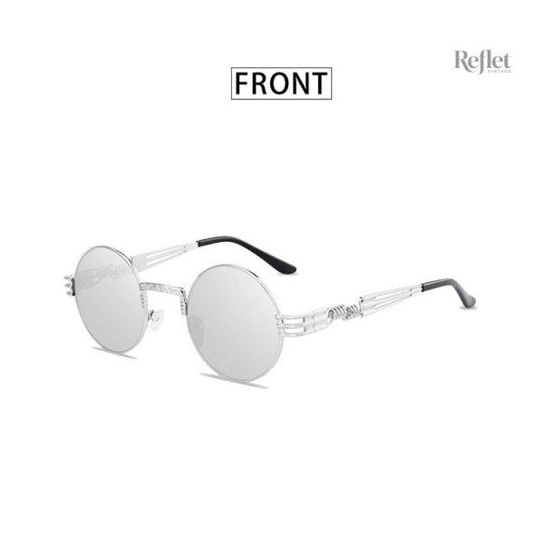 Look chic avec lunettes de soleil à monture ronde