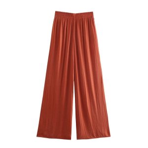 Pantalon vintage femme orange, style rétro