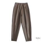 Pantalon vintage femme vert à taille haute, look classique et élégant