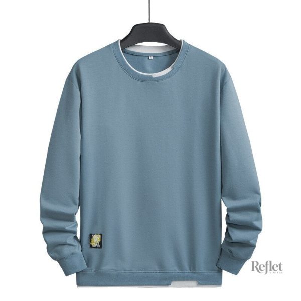 pull-bleu-vintage-homme-1 Pull vintage bleu pour homme élégant et intemporel.