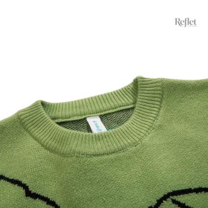 Pull vintage avec motif dinosaure