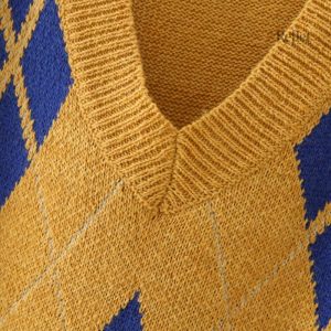 Pull femme vintage, sans manche, style intemporel