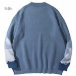 Pull femme style rétro avec design montagne