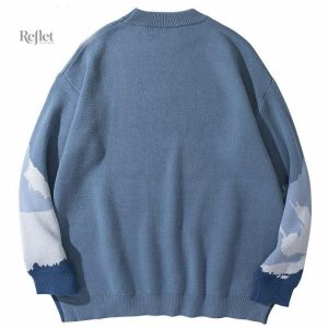 Pull femme style rétro avec design montagne