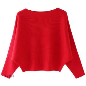 Pull vintage rouge pour femme, style rétro élégant.