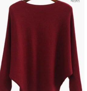 Pull rouge femme, vintage, idéal pour un look décontracté.