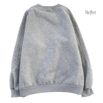 Pull tendance au design classique, ajout élégant à votre garde-robe