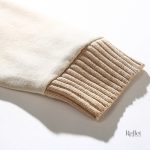 Tricot vintage beige, incontournable pour une garde-robe féminine