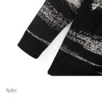 Pull classique homme en teintes noires et blanches