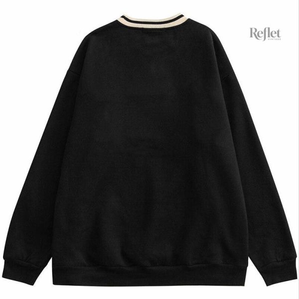 Vêtement féminin pull vintage avec look old school