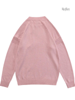 Pull vintage féminin en rose, confort et élégance assurés