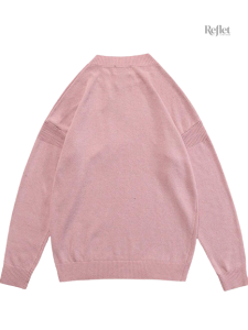 Pull vintage féminin en rose, confort et élégance assurés