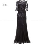 Robe vintage noire avec détails dorés des années 20