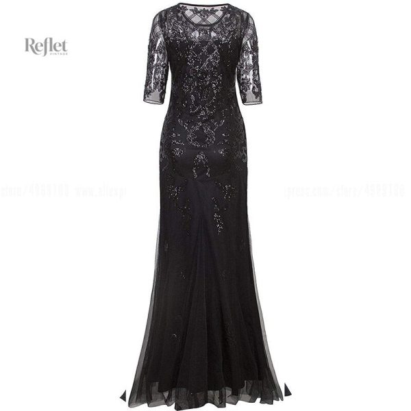 Robe vintage noire avec détails dorés des années 20