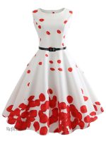 Robe années 60, fleurs colorées sur fond uni