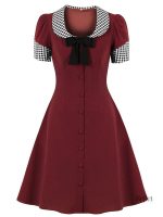 Robe rétro années 50, nœud stylé et féminin