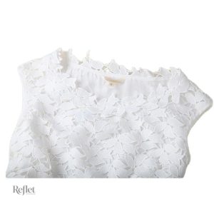 Robe blanche classique des années 80 pour un look nostalgique