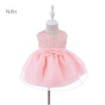 Robe bébé blanche avec jupe en tulle