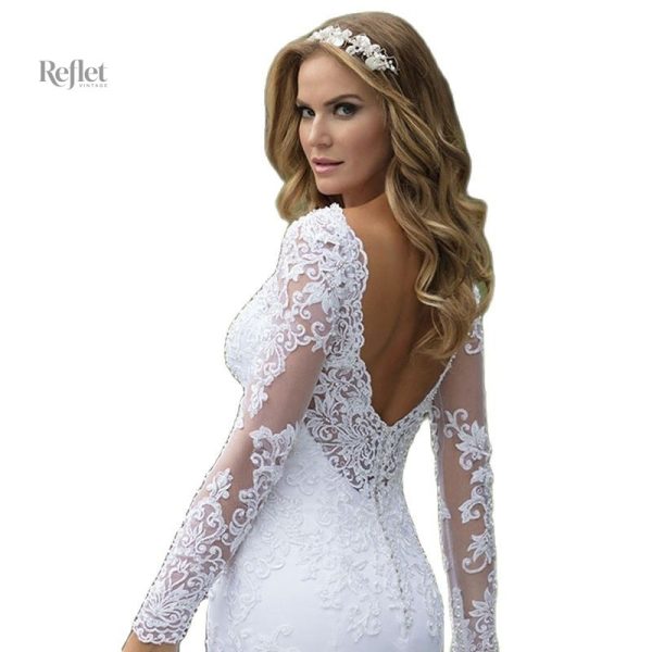 Robe de mariée avec corsage ajusté et jupe volumineuse