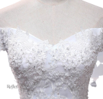 Robe de mariée intemporelle avec jupe volumineuse