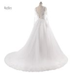 Robe de mariage drapée pour un look royal