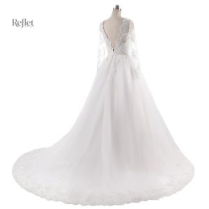 Robe de mariage drapée pour un look royal