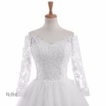 Robe de mariage blanche avec corsage ajusté et tulle