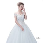 Robe de mariée princesse blanc cassé élégante