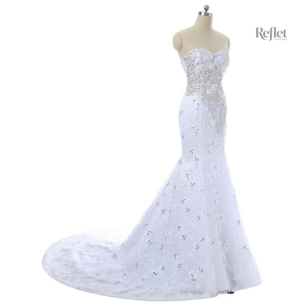 Robe élégante à corsage bleu et jupe blanche