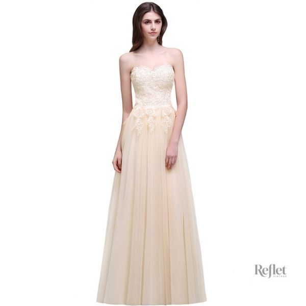 Robe de mariée beige avec jupe princesse
