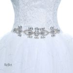 Détails champs floraux et jupe volumineuse pour mariage féerique