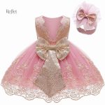 Robe bébé avec ceinture en satin