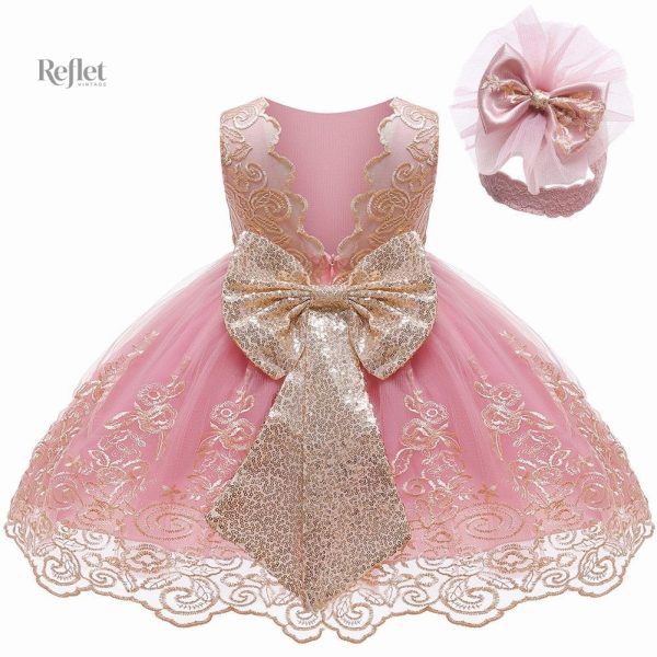 Robe bébé avec ceinture en satin