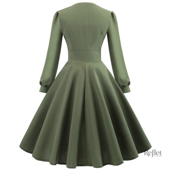Mode féminine des années 40, robe chic et classique