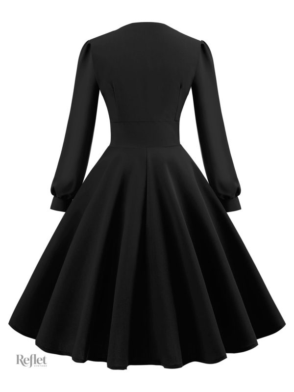 Robe féminine inspirée des années 40, look sophistiqué
