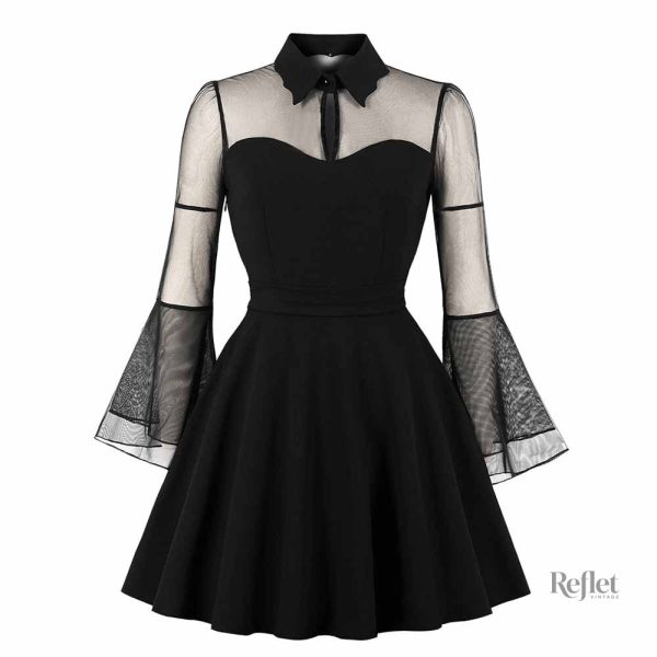 Robe noire courte évoquant le glamour des années 30