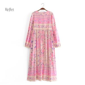 Robe rose à motifs floraux style année 70