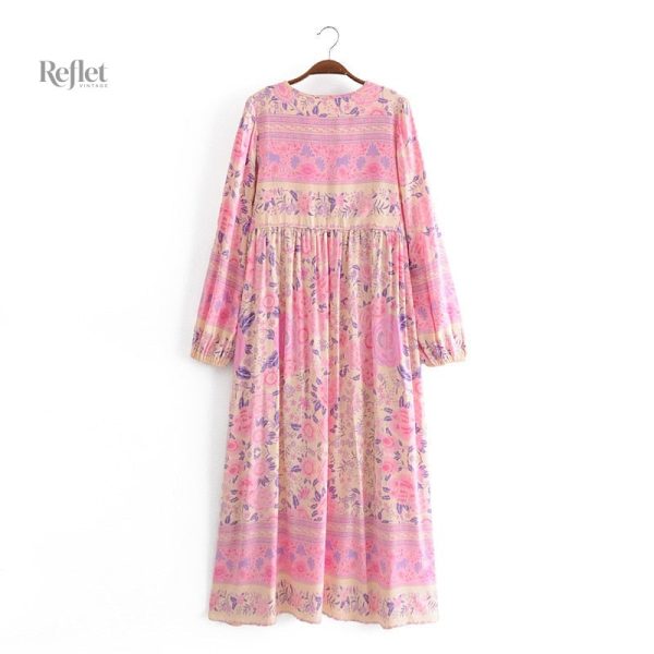 Robe rose à motifs floraux style année 70