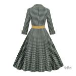 Vêtement vintage vert années 50, idéal pour une occasion spéciale