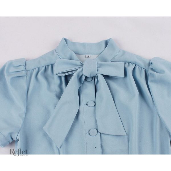Robe années 60, coupe intemporelle avec nœud