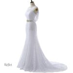 Robe de mariée avec jupe volumineuse et délicates broderies